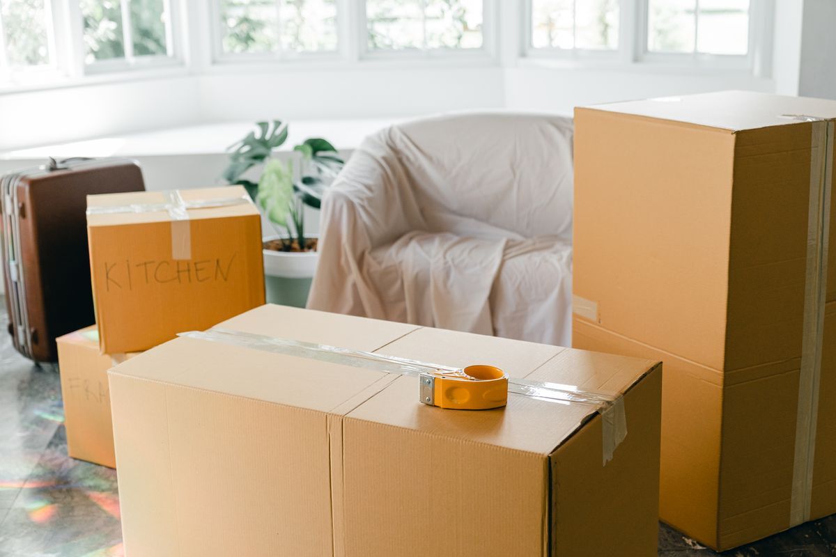 Packed cardboard boxes during a house clearance in Colchester